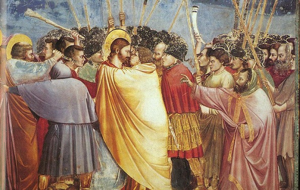 Jesús, que se encontraba con sus discípulos en el huerto de los olivos en Getsemaní, es identificado al recibir el Beso de Judas, una señal convenida, y símbolo de su traición, y arrestado por el Ejército del Sanedrín, que le conducirá ante distintas instancias que debatirán su enjuiciamiento.