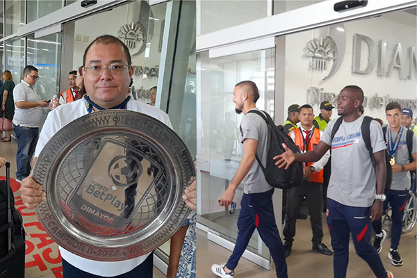 En la imagen  Alberto Mario Garzón Wilches, presidente del Unión Magdalena con el título del campeonato de ascenso y los jugadores llegando al Aeropuerto Internacional Simón Bolivar, para preparar la gran final del torneo de ascenso. Foto Ly Erick Amasyfuen