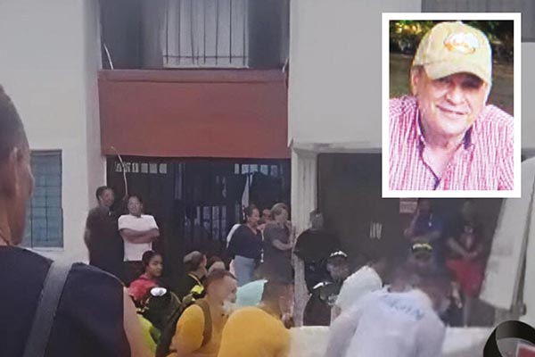 Momento en que las autoridades hacen el levantamiento del cuerpo. 