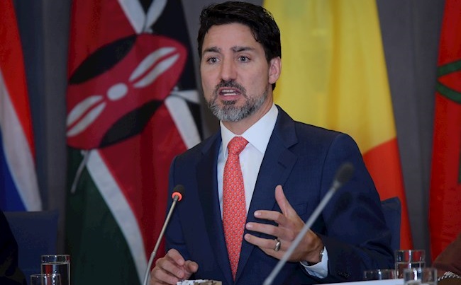 En la imagen un registro del primer ministro de Canadá, Justin Trudeau, quien declaró que las primeras dosis de las vacunas compradas por su país podrían estar disponibles a principios de 2021, aunque la distribución masiva a la población tardaría más tiempo en llegar. EFE