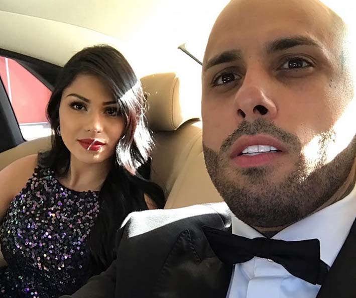 Nicky Jam  y su bella esposa Angélica Cruz.