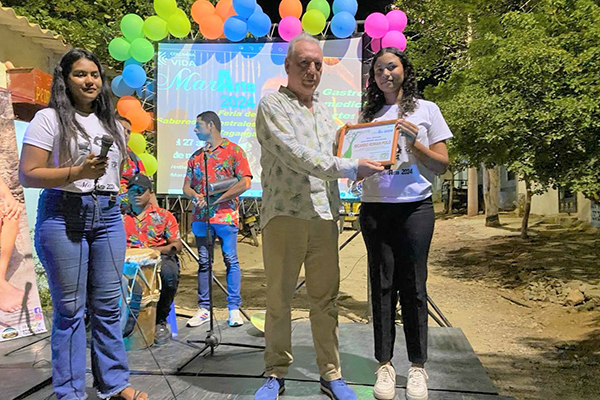  “Transfiguraciones” cuyo evento central fue el Desfile de moda de la línea “Chinchorro, Tejido Ancestral”. presentó los diseños de lideresas de Taganga como María Mercedes Cantillo. Katherine Asís, y la participación del tejedor de chinchorros ancestral Silvano Garay. 