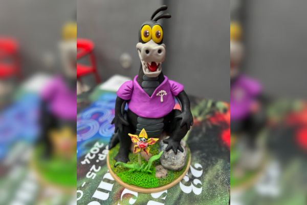 Yac, el caimán negro, protagonista de la animación que da concejos de como cuidar el medio ambiente. 